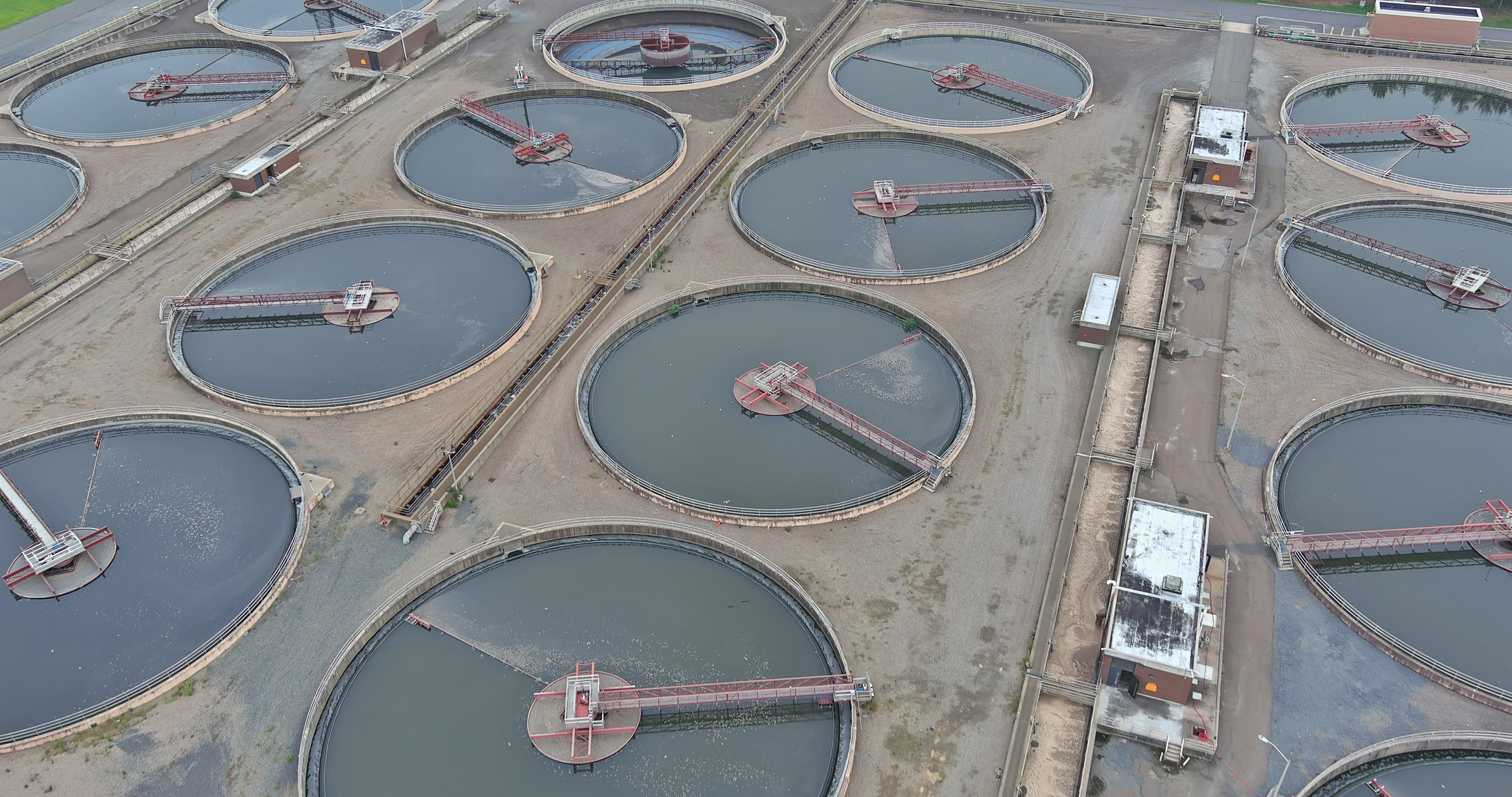 Aerial top view in dirty sewage water of wastewater treatment process plant, filtration